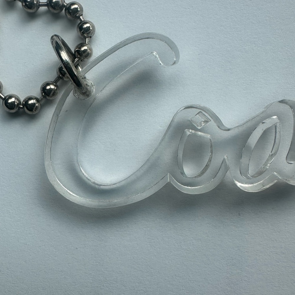Coach Poppy Clear Script Tag Keychain - Picture 2 of 13